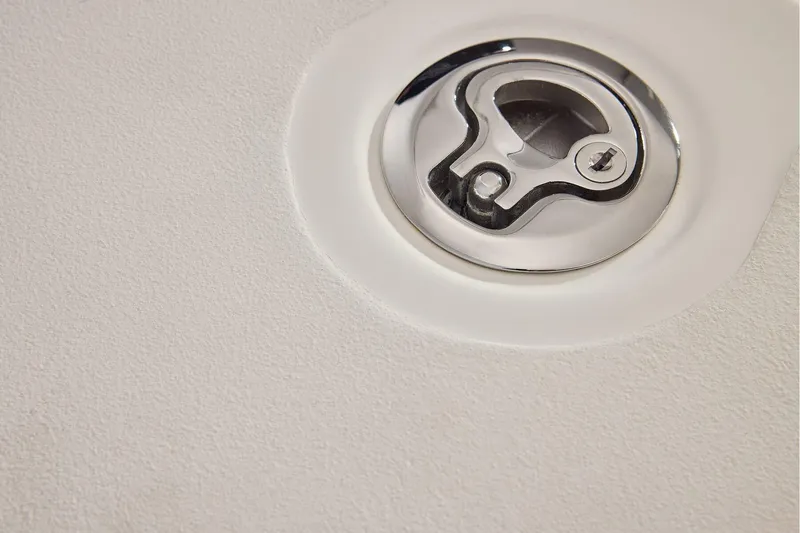 Slide: The Image of Close-up of a 2026 Mako 24 APEX boat deck fitting. - 54