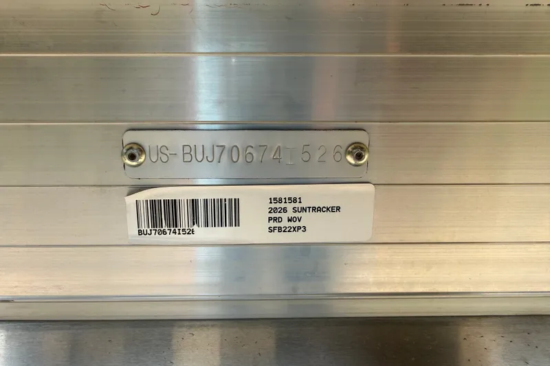 Slide: The Image of Hull identification number and barcode on 2026 Sun Tracker Fishin' Barge 22 XP3. - 17