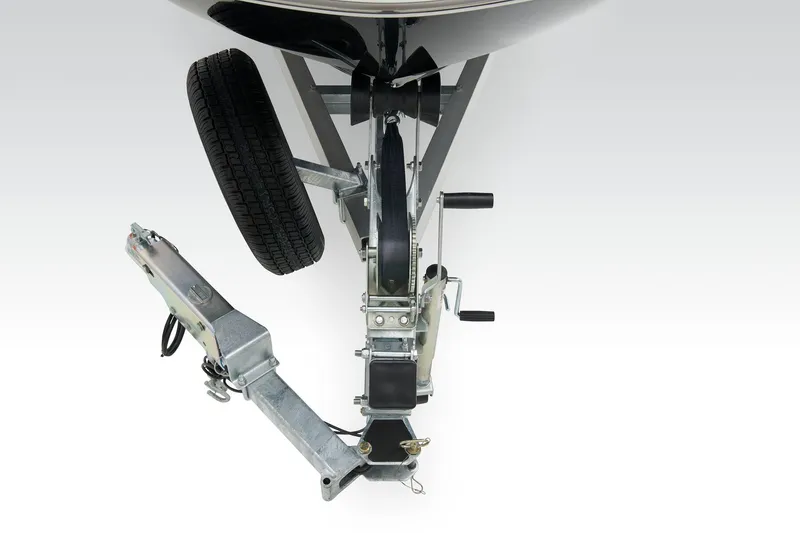 Slide: The Image of 2026 Tahoe T21 boat interior with open storage compartment and seating. - 18