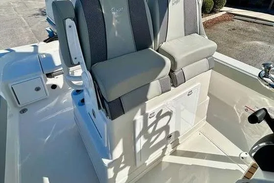 Slide: The Image of 2026 Ranger 2360 Bay boat seats with gray and white upholstery, showcasing modern design. - 12