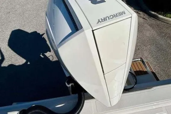Slide: The Image of 2026 Ranger 2360 Bay boat with Mercury outboard engine, viewed from above. - 16