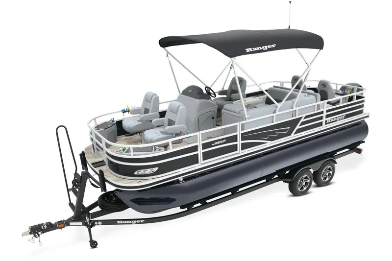 Slide: The Image of 2025 Ranger Reata 223F boat interior with plush seating and modern design. - 3