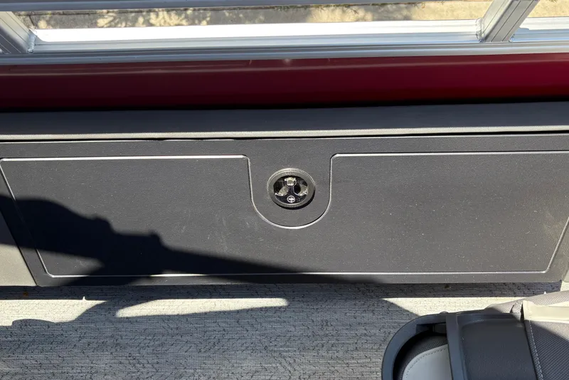 Slide: The Image of Storage compartment on 2026 Sun Tracker Fishin' Barge 22 XP3 pontoon boat interior. - 36