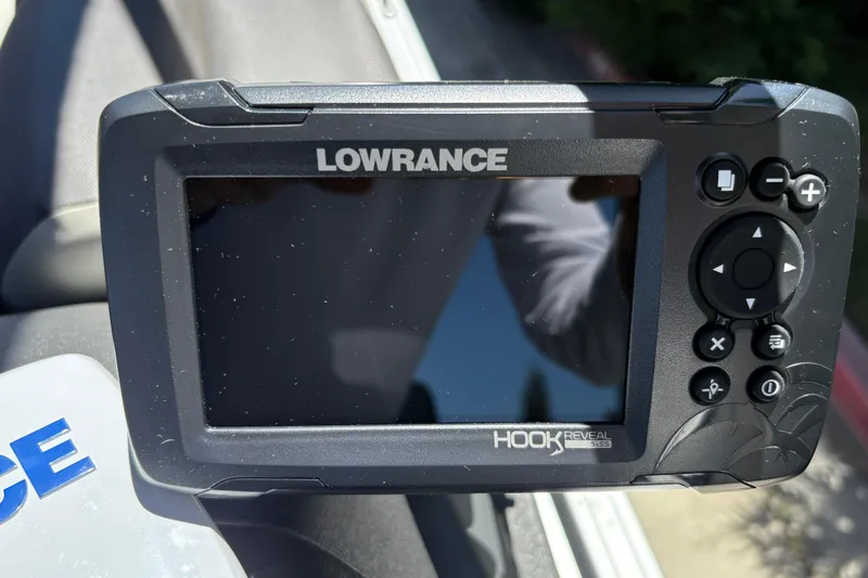 Slide: The Image of Lowrance Hook Reveal fish finder on 2026 Sun Tracker Fishin' Barge 22 XP3. - 33
