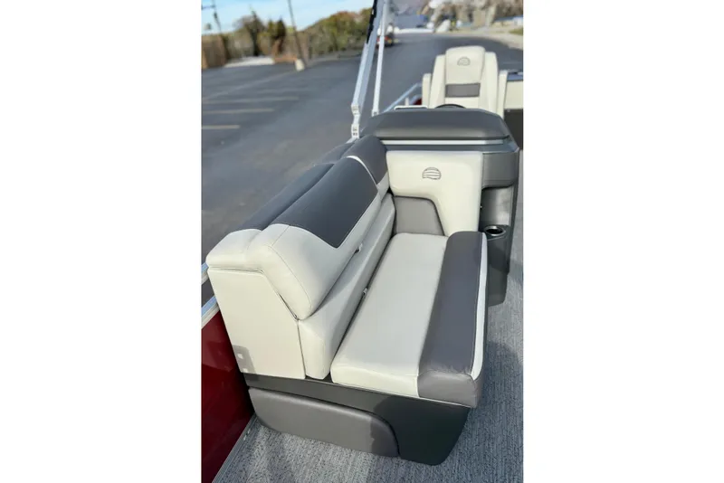 Slide: The Image of 2026 Sun Tracker Fishin' Barge 22 XP3 boat seat, gray and white upholstery. - 120