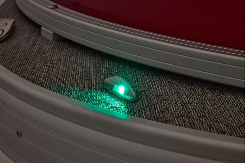 Slide: The Image of Steering console of 2026 Sun Tracker Fishin' Barge 22 XP3 with Lowrance system. - 16