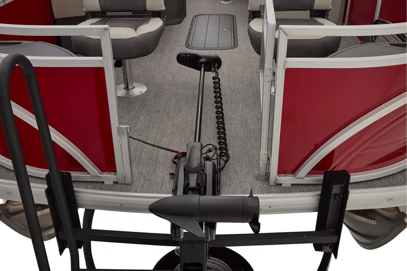 Slide: The Image of 2026 Sun Tracker Fishin' Barge 22 XP3 steering console with modern controls and dashboard. - 22