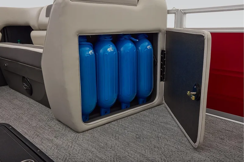 Slide: The Image of Battery compartment of 2026 Sun Tracker Fishin' Barge 22 XP3 with cup holder. - 35