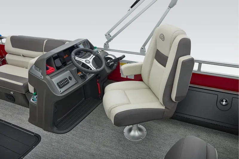 Slide: The Image of 2026 Sun Tracker Fishin' Barge 22 XP3 storage compartment with cup holder and railing. - 36