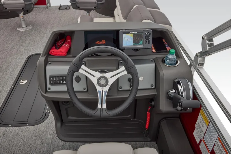 Slide: The Image of Close-up of 2026 Sun Tracker Fishin' Barge 22 XP3 V6 engine cover. - 39