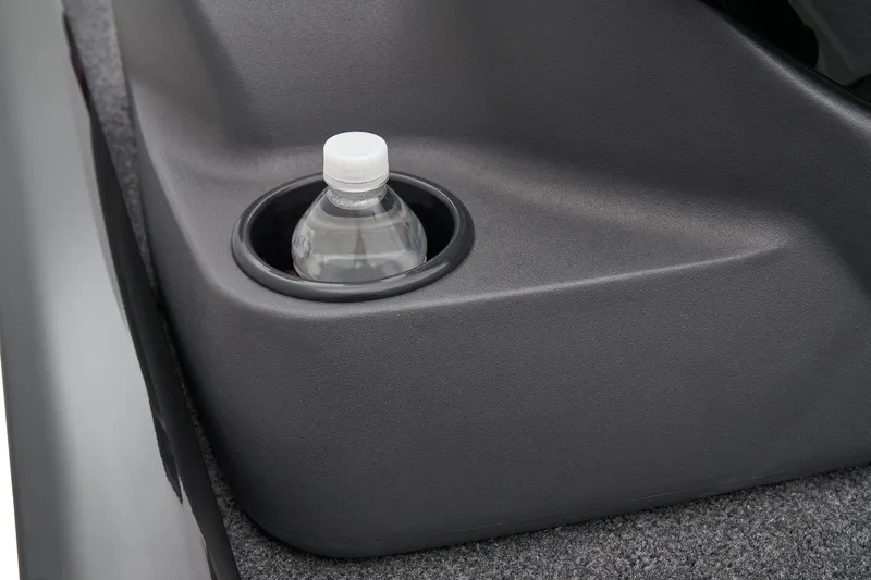 Slide: The Image of 2026 Tracker Pro 170 boat interior with steering wheel, gauges, and storage compartments. - 23