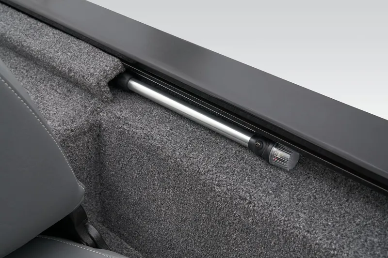 Slide: The Image of 2026 Tracker Pro 170 boat interior with gray carpet and black seats. - 33