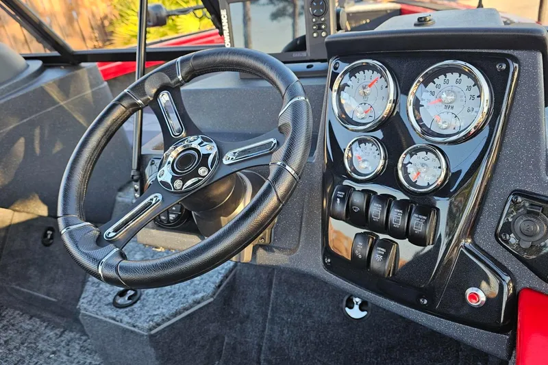 Slide: The Image of 2026 Tracker Targa V-19 Combo boat interior with Minn Kota trolling motor. - 9