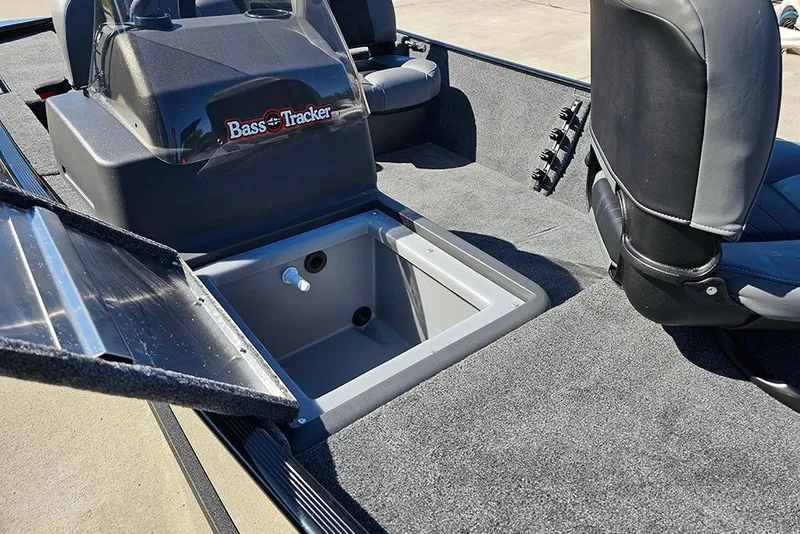 Slide: The Image of 2026 Tracker Bass Tracker Classic XL boat interior with open storage compartment. - 15