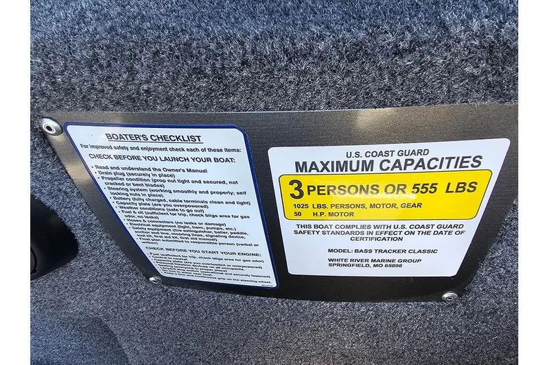 Slide: The Image of Boater's checklist and capacity label on 2026 Tracker Bass Tracker Classic XL boat. - 16