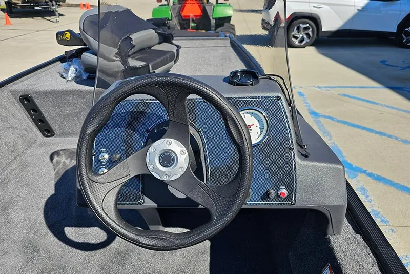 Slide: The Image of Steering wheel and dashboard of 2026 Tracker Bass Tracker Classic XL boat. - 17