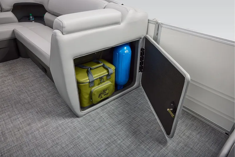 Slide: The Image of Manufacturer Provided Image: 2026 Sun Tracker Party Barge 20 DLX storage compartment with cooler and blue fender. - 64