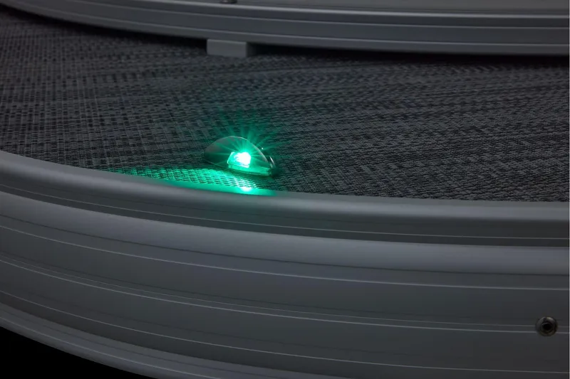 Slide: The Image of Manufacturer Provided Image: 2026 Sun Tracker Party Barge 20 DLX with illuminated green navigation light. - 78