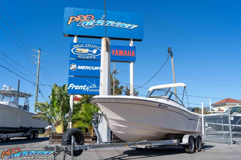 Slide: The Image of 2016 Grady-White Freedom 225 boat on trailer at Pro Marine dealership. - 2