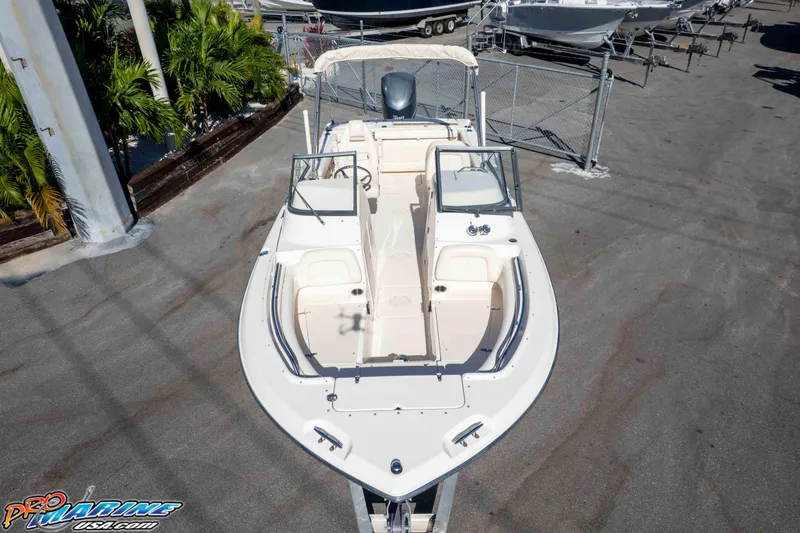 Slide: The Image of 2016 Grady-White Freedom 225 boat, aerial view, parked on concrete lot. - 31