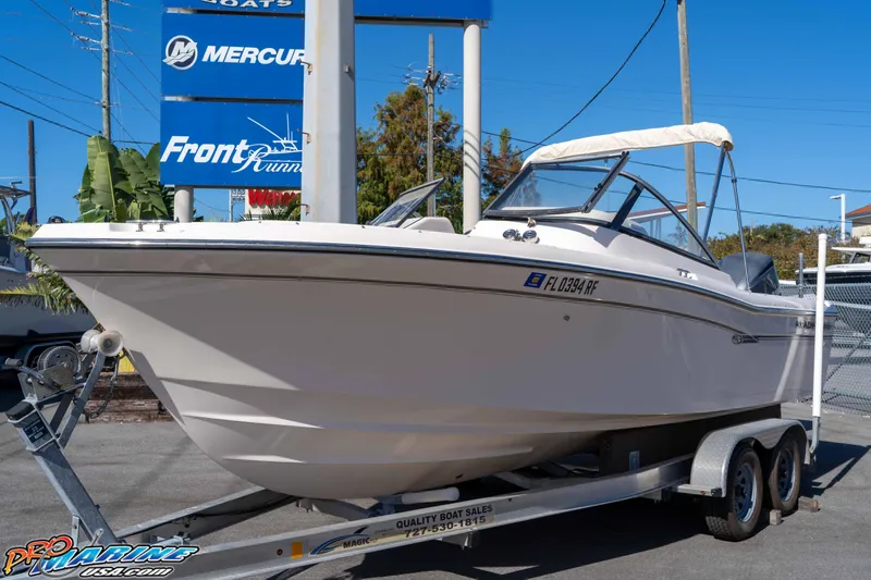 Slide: The Image of 2016 Grady-White Freedom 225 boat on trailer at dealership. - 5