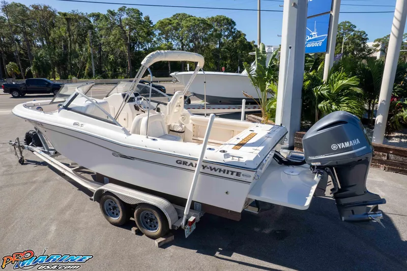 Slide: The Image of 2016 Grady-White Freedom 225 boat on trailer with Yamaha outboard motor. - 8