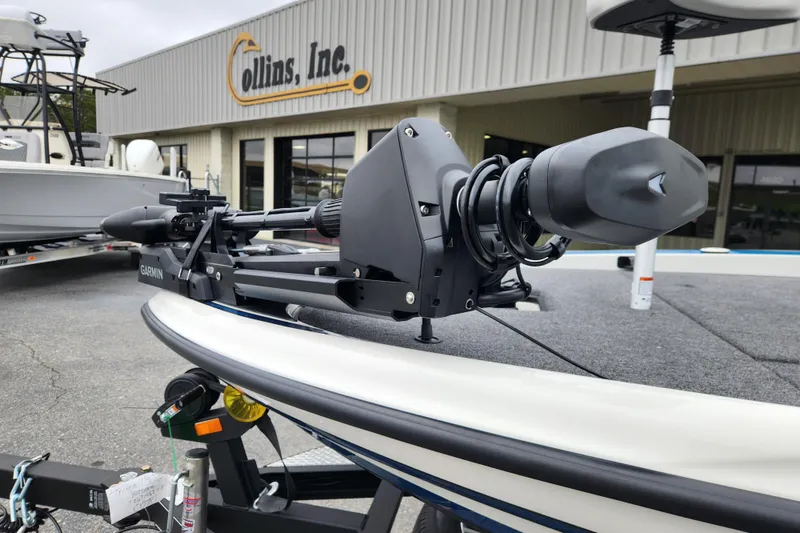 Slide: The Image of 2026 Triton 19 TrX Patriot boat with Garmin trolling motor at Collins Inc. dealership. - 7