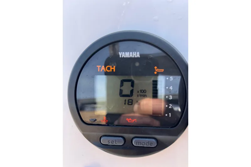 Slide: The Image of Yamaha tachometer display on Rossiter 14, 2023 model, showing RPM and warning indicators. - 6