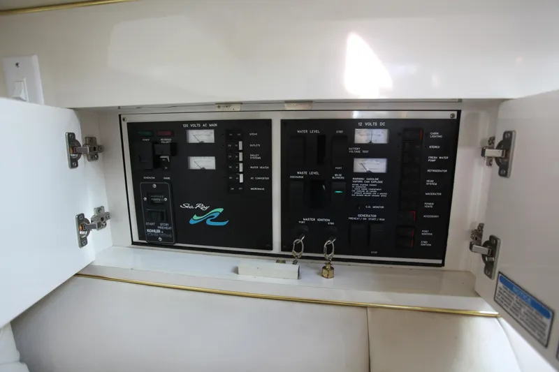 Slide: The Image of Electrical control panel on a 1997 Sea Ray 330 Express Cruiser boat. - 8