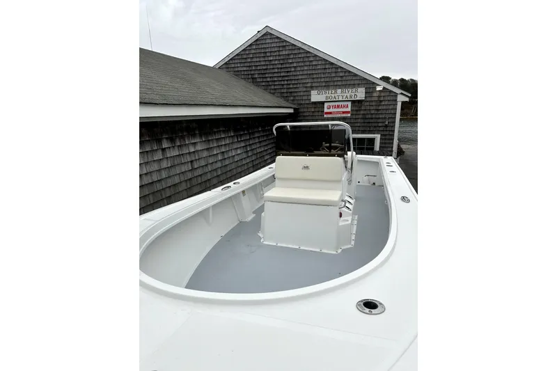 Slide: The Image of 2025 Steiger Craft 21 Classic boat at Oyster River Boatyard, featuring a sleek white deck. - 3