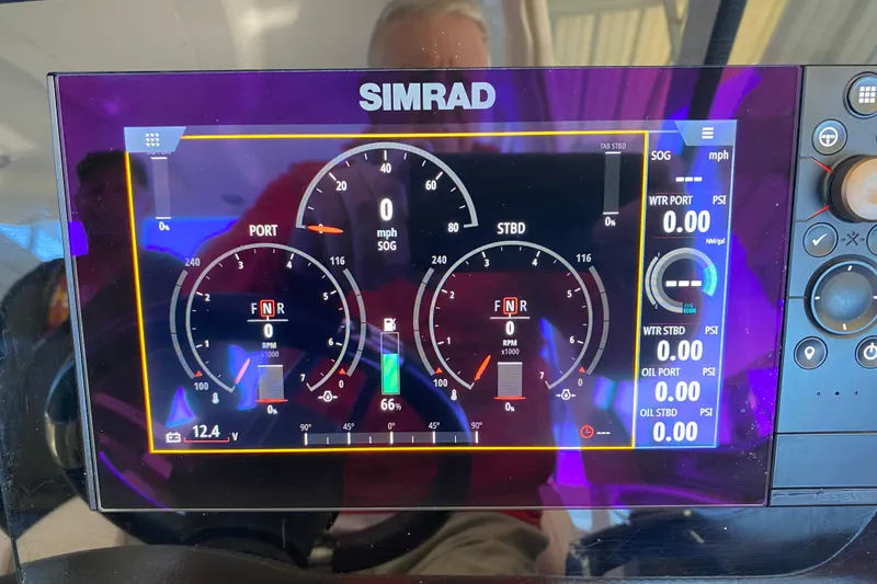 Slide: The Image of Simrad display on 2018 Chaparral 337 SSX showing engine and navigation data. - 33