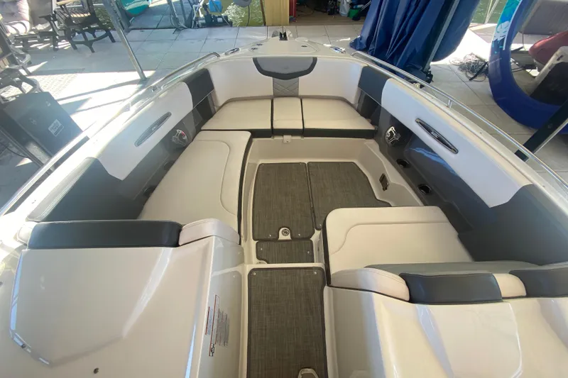 Slide: The Image of 2018 Chaparral 337 SSX boat interior with spacious seating and modern design. - 36