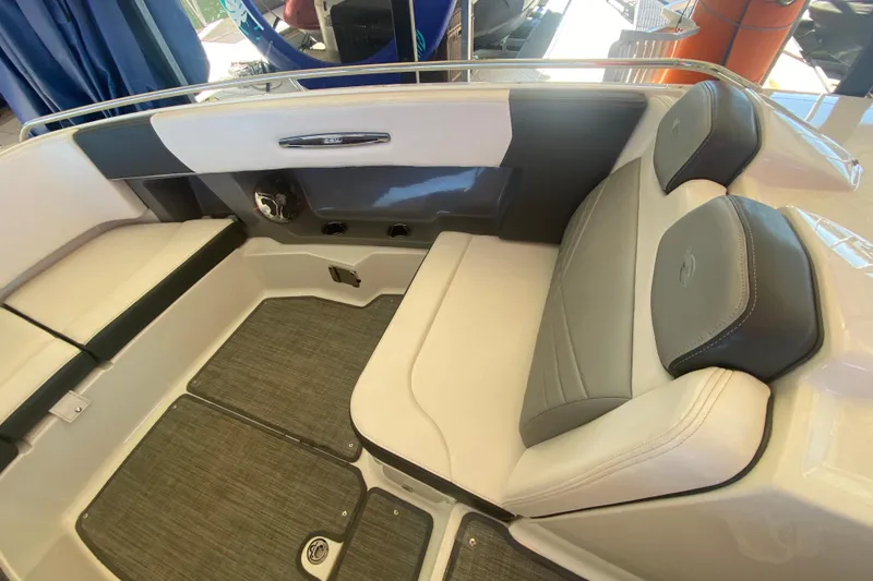 Slide: The Image of Interior seating of 2018 Chaparral 337 SSX boat, featuring sleek design and comfortable upholstery. - 38