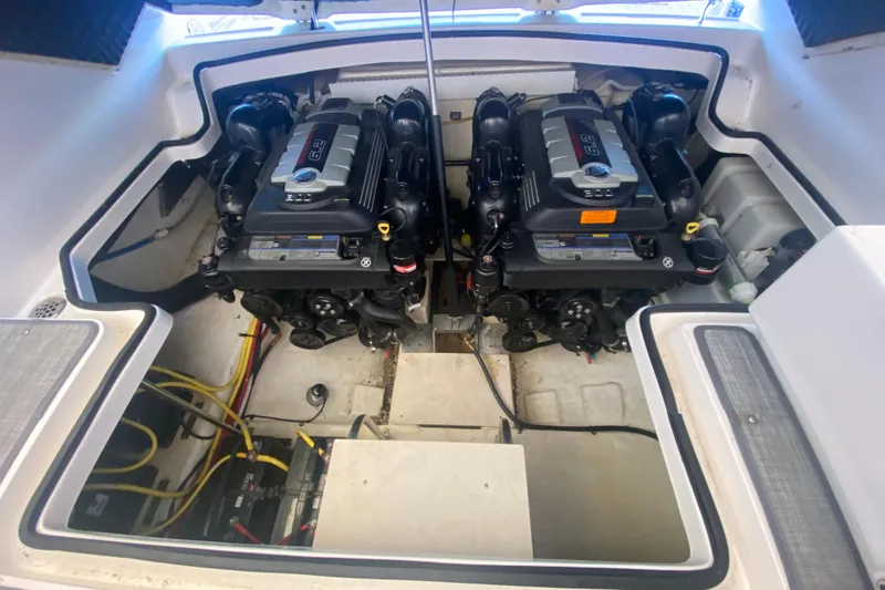 Slide: The Image of 2018 Chaparral 337 SSX engine compartment with dual engines and wiring. - 41