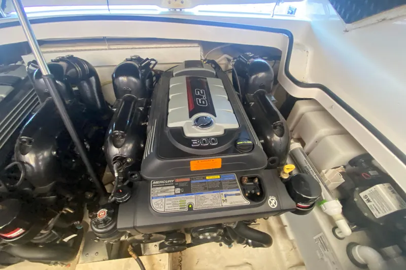 Slide: The Image of Engine compartment of 2018 Chaparral 337 SSX boat, featuring a Mercury 6.2L engine. - 43