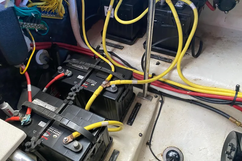 Slide: The Image of Engine compartment of 2018 Chaparral 337 SSX with batteries and wiring. - 46