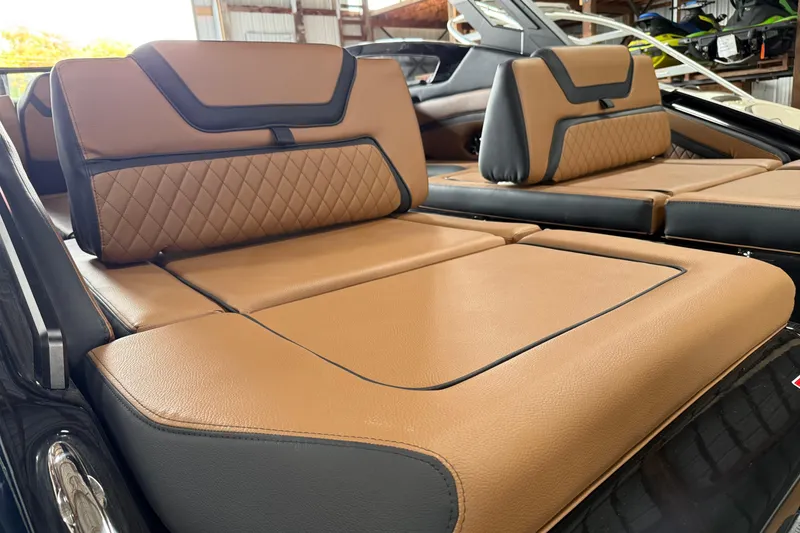 Slide: The Image of Luxurious tan seating on 2026 Yamaha Boats 275SD, showcasing premium design and comfort. - 2