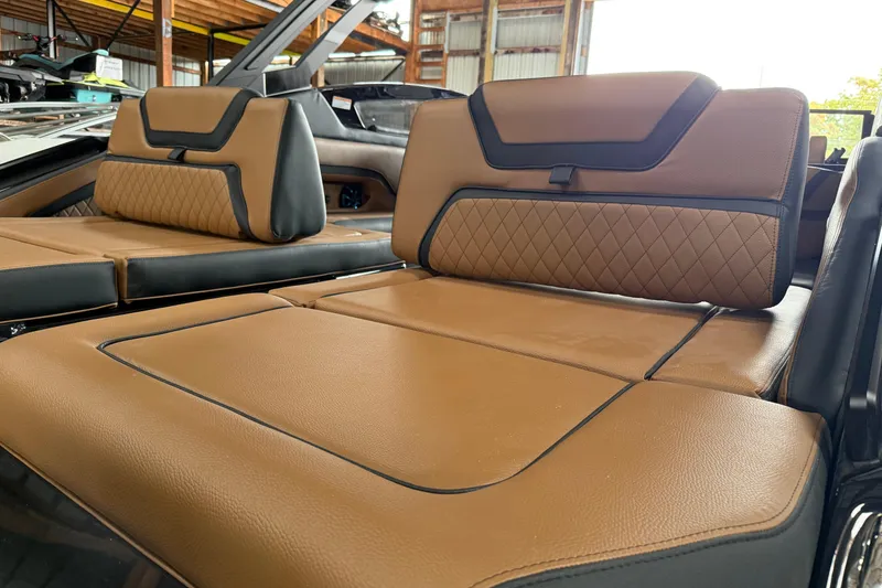 Slide: The Image of Luxurious tan and black seating on 2026 Yamaha Boats 275SD, showcasing premium design. - 3