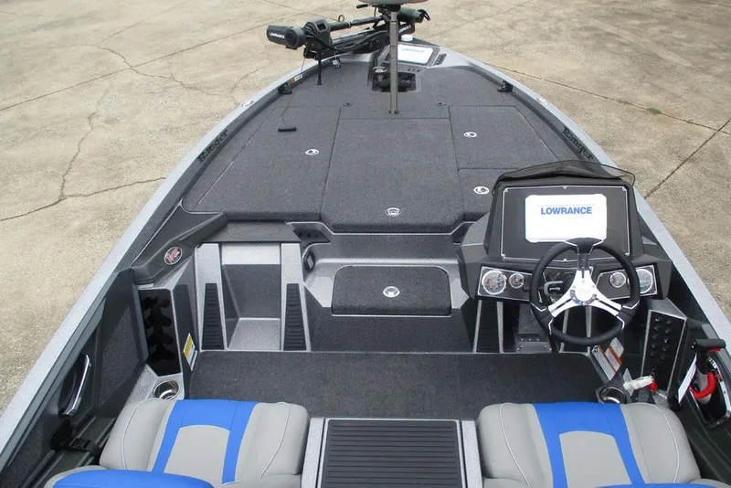 Slide: The Image of 2026 Ranger Z518 Cup-Equipped boat interior with steering wheel and Lowrance display. - 6
