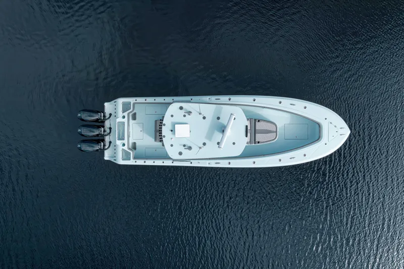 Slide: The Image of Aerial view of 2026 Front Runner 36' Center Console boat on water. - 1