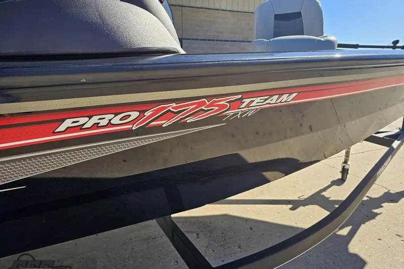 Slide: The Image of 2018 Tracker Pro Team 175 TXW boat with red and white graphics on the side. - 15