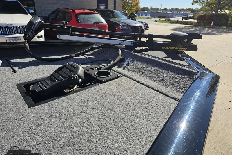 Slide: The Image of 2018 Tracker Pro Team 175 TXW boat with Minn Kota trolling motor on deck. - 16