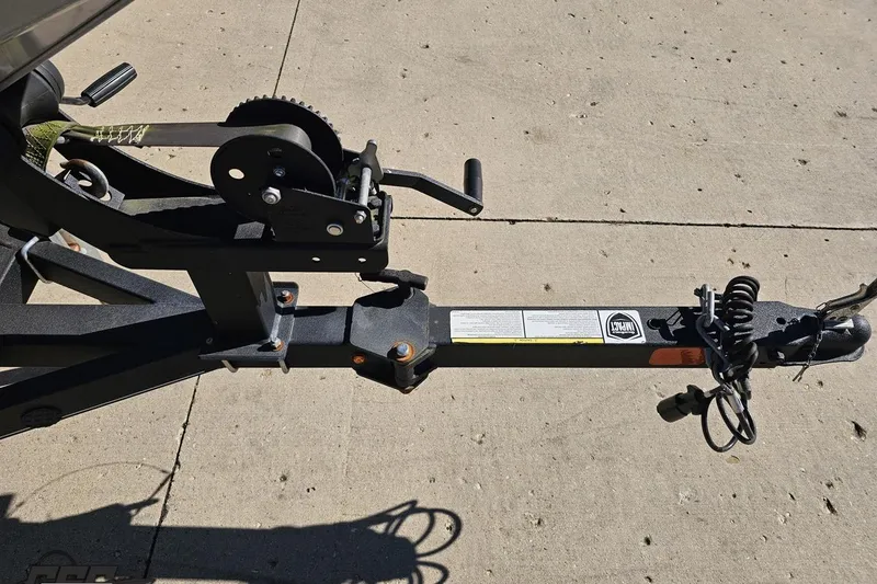 Slide: The Image of Trailer hitch of a 2018 Tracker Pro Team 175 TXW on concrete surface. - 17