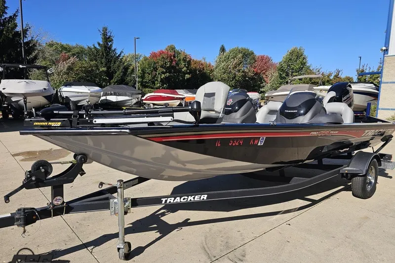 Slide: The Image of 2018 Tracker Pro Team 175 TXW boat on trailer, parked outdoors. - 22