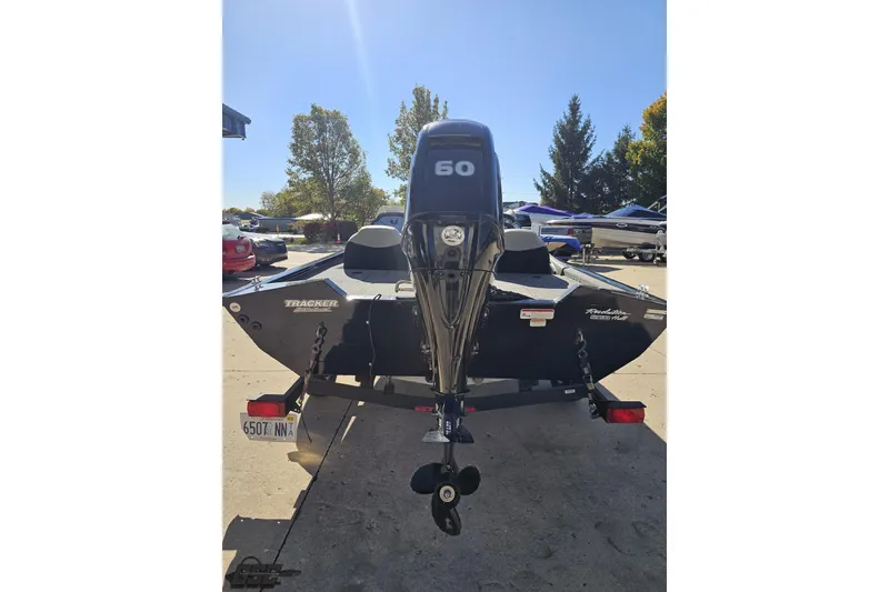 Slide: The Image of 2018 Tracker Pro Team 175 TXW boat with 50 HP motor on trailer. - 38