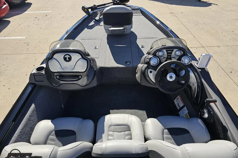Slide: The Image of 2018 Tracker Pro Team 175 TXW boat interior with steering console and seating. - 42