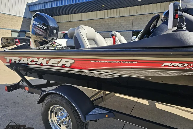 Slide: The Image of 2018 Tracker Pro Team 175 TXW boat, 40th Anniversary Edition, with Mercury engine, parked outside. - 5