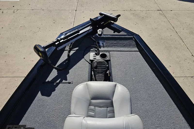 Slide: The Image of 2018 Tracker Pro Team 175 TXW boat interior with steering and seating. - 60