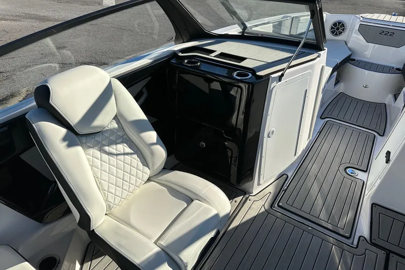 Slide: The Image of 2024 Yamaha Boats 222SD interior with luxurious seating and sleek design. - 5
