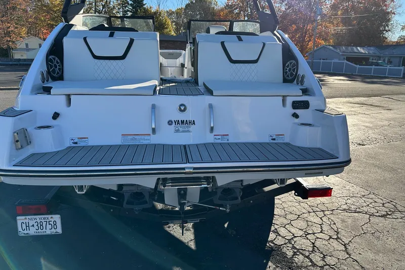 Slide: The Image of 2024 Yamaha Boats 222SD rear view, showcasing sleek design and modern features. - 8